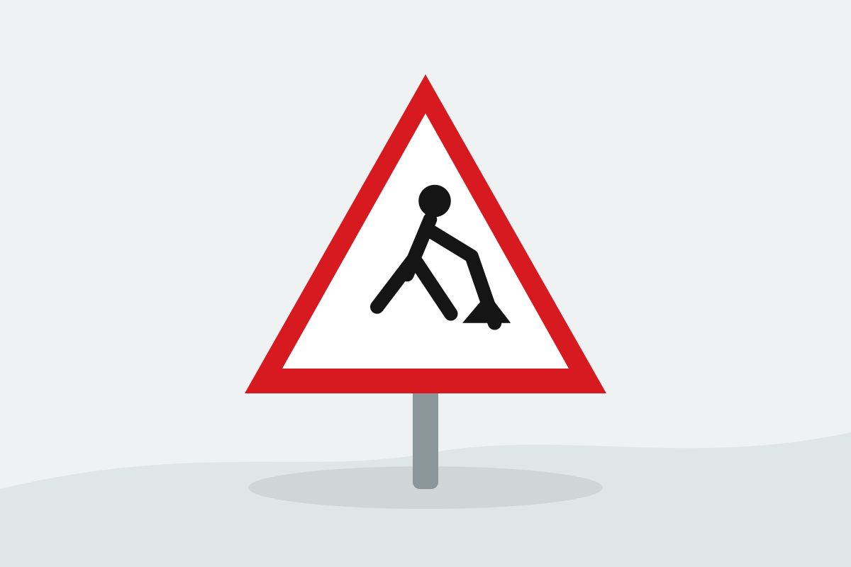 Eigenständig gezeichnetes Verkehrszeichen mit einem roten Dreieck und einer schwarzen arbeitenden Person mit Schaufel.