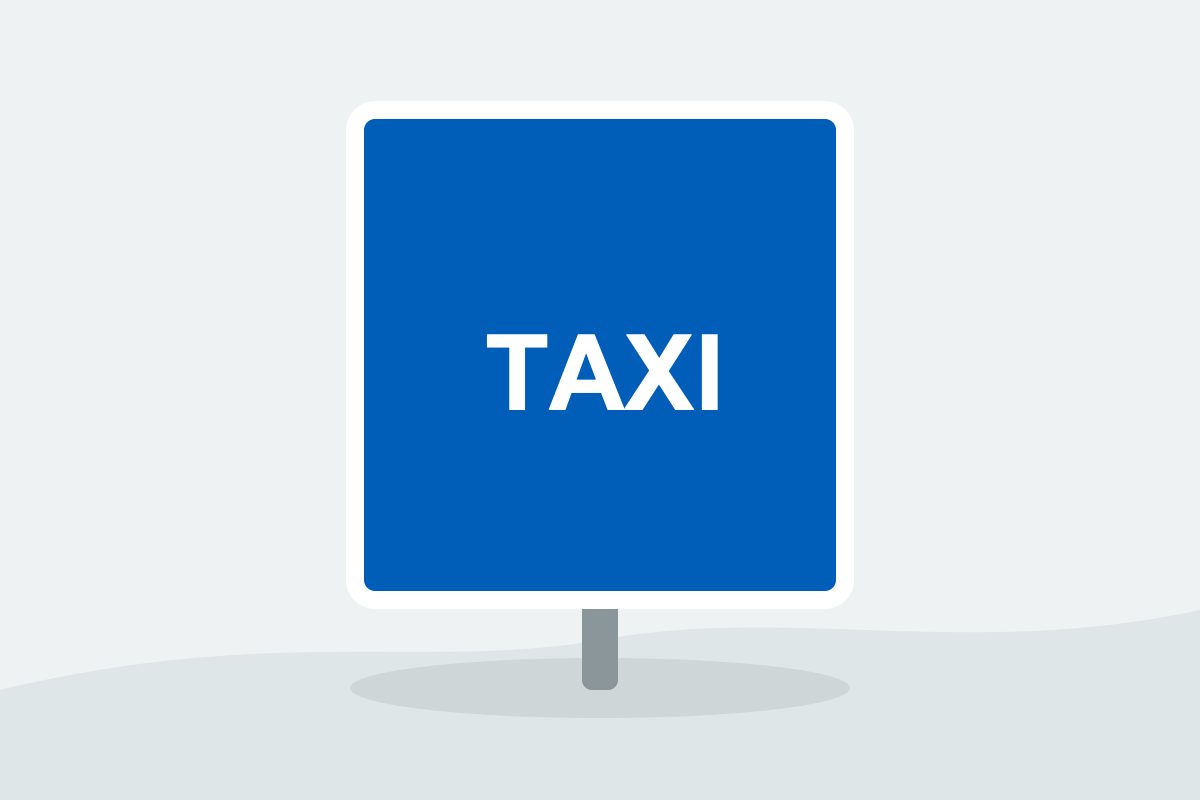 Eigenständig gezeichnetes Verkehrszeichen mit einem blauen Rechteck mit weißem TAXI-Schriftzug.