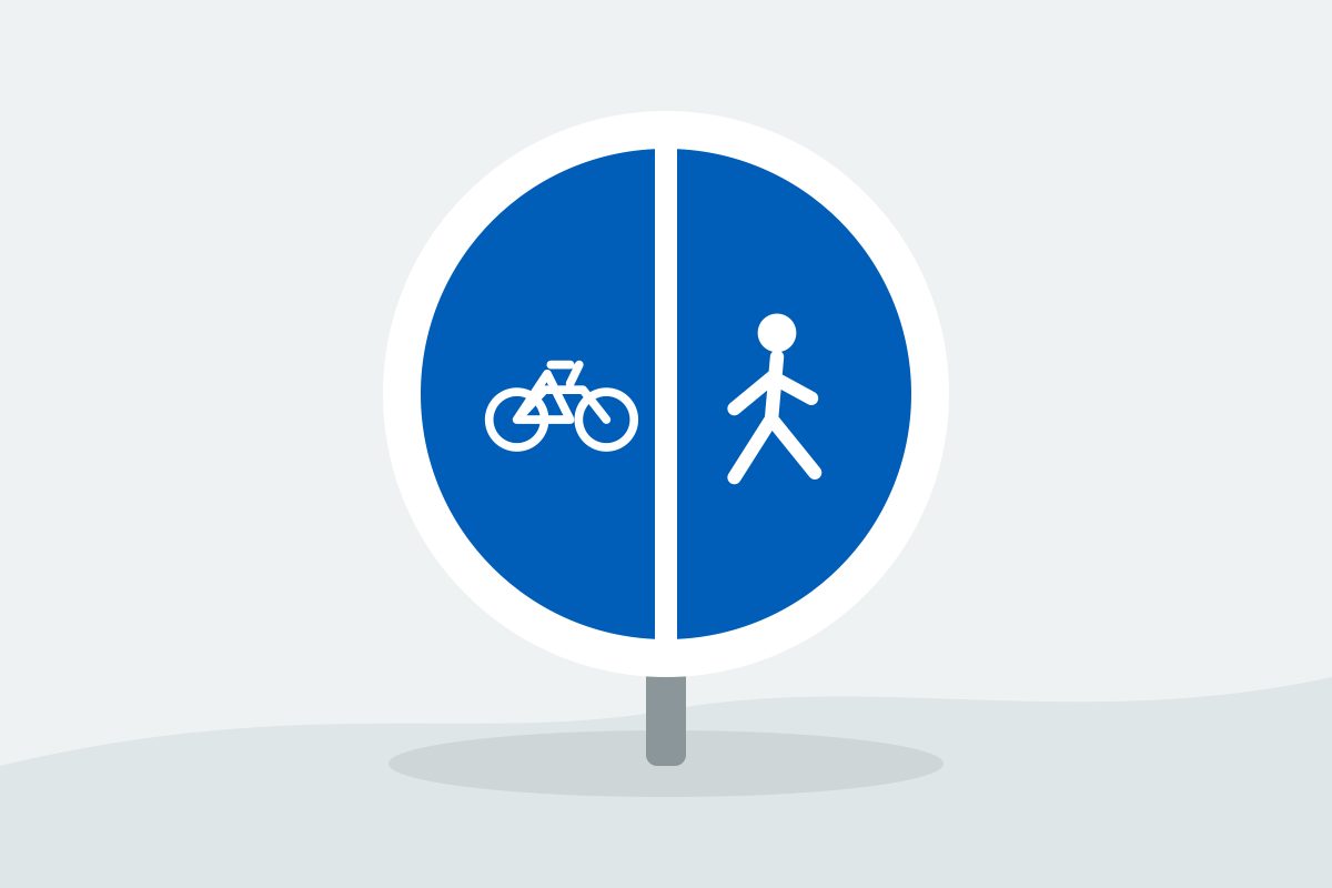 Eigenständig gezeichnetes Verkehrszeichen mit einem geteilten blauen Kreis mit weißem Fahrrad und weißer Person nebeneinander.
