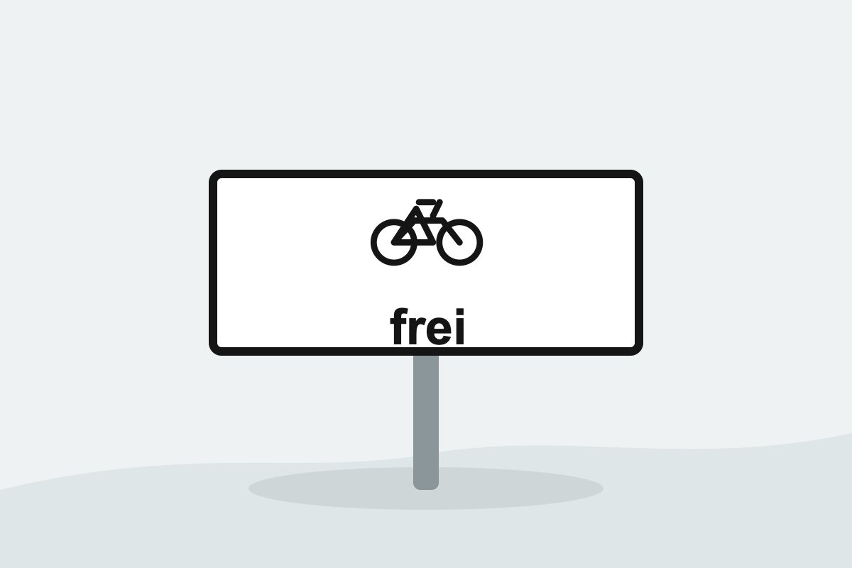 Eigenständig gezeichnetes Verkehrszeichen mit einer weißen Zusatztafel mit schwarzem Fahrrad und dem Wort frei.